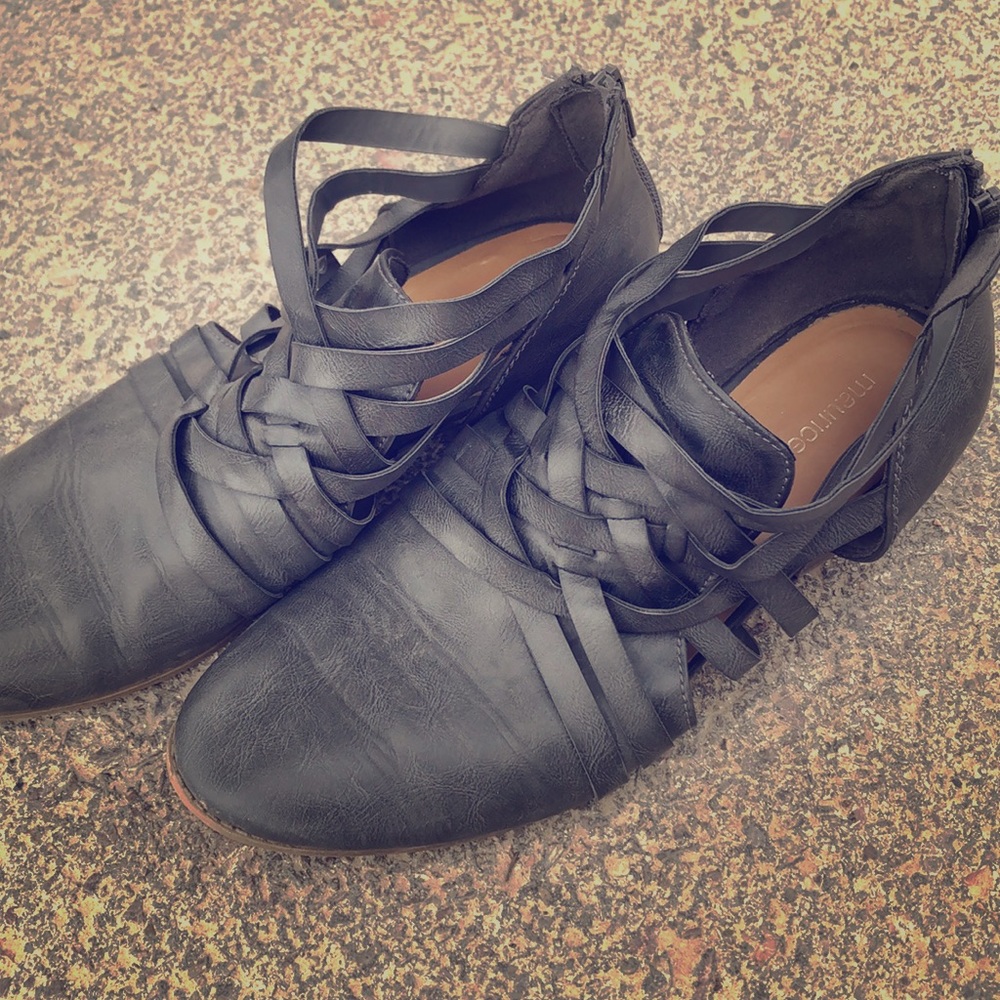 Grey shoes with pattern over top